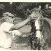 Charlie Carter was one of Aiken’s best known groomsmen.  He worked with Greentree Stable from 1955 - 1973.  Carter is shown with with Stage Door Johnny the winner of the 1968 Belmont Stakes.

