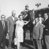 Dan and Ada Rice (second and third from the left) stand in the 1965 Kentucky Derby winner’s circle with Thoroughbred Lucky Debonair, jockey Willie Shoemaker and trainer Frank Catrone (third from the right). Photo by Churchill Downs and Kinetic Corporation.
 