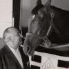 Trainer, Frank Catrone with Lucky Debonair. (photo Warren Klosterman with The Courier-Journal).