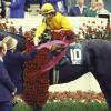 Laffit Pincay, Jr. being congratulated by Woody Stephens after winning the 1984 Kentucky with Swale.